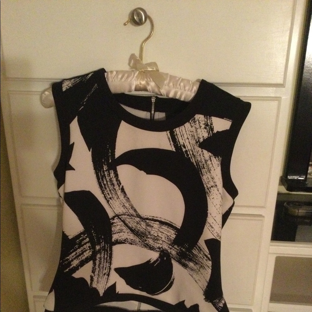 Black and White zips in back